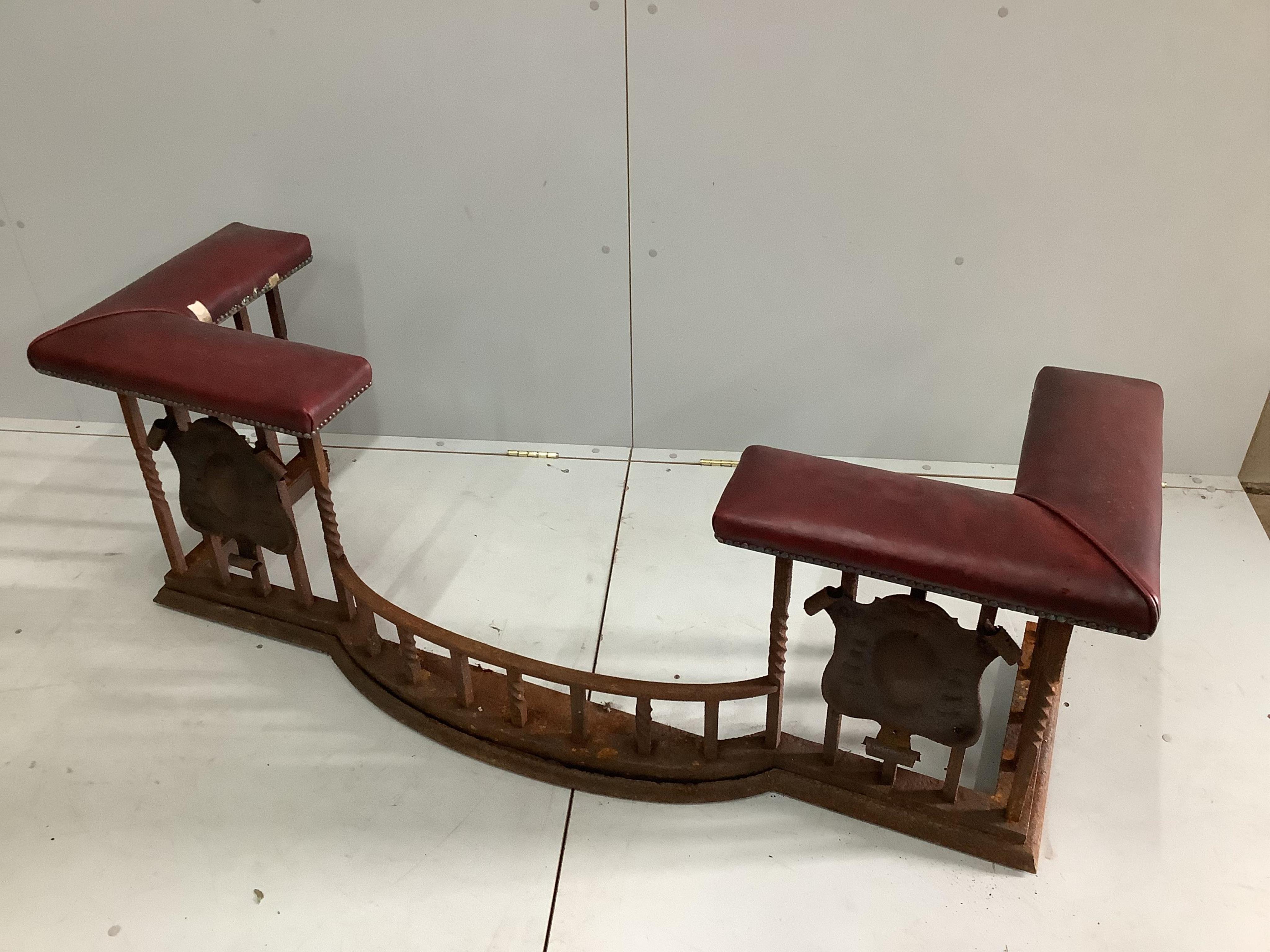 An early 20th century wrought and cast iron bow front club fender, width 160cm, depth 56cm, height 55cm. Condition - poor (in need of restoration)